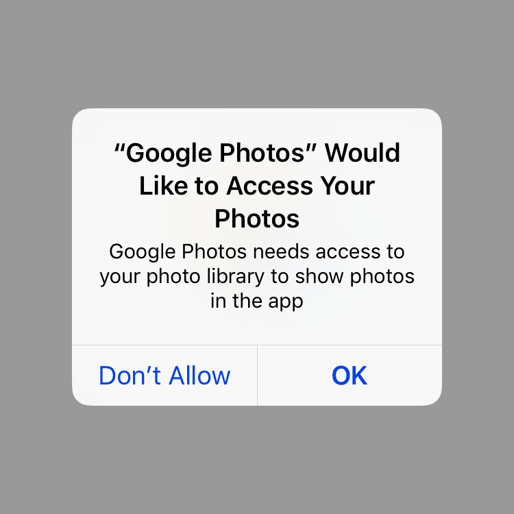 Снимок экрана iPhone приложения Google Фото с просьбой разрешить доступ к фотографиям