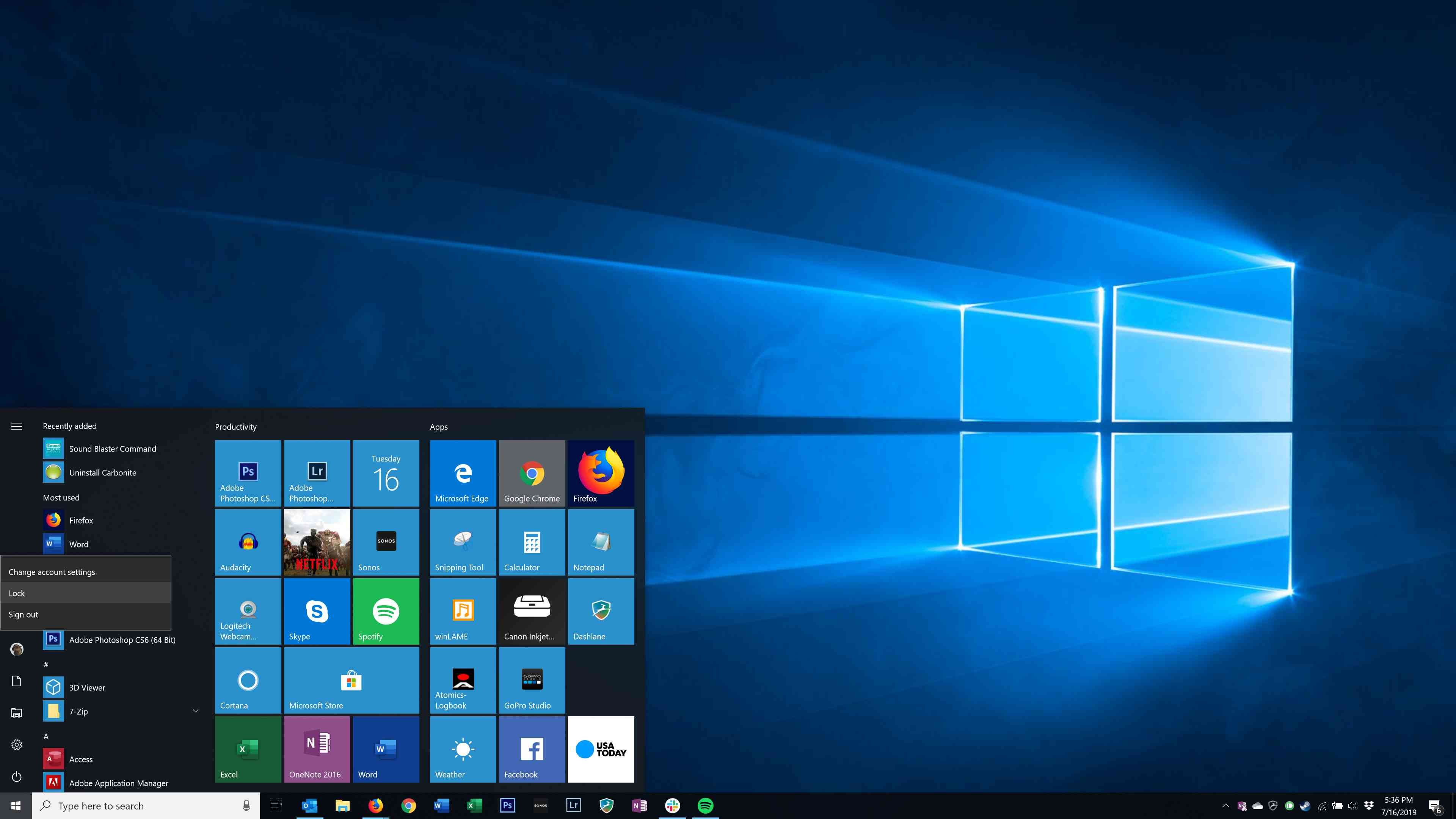 Рабочий стол Windows с открытым меню «Пуск» и выбранным параметром «Экран блокировки».