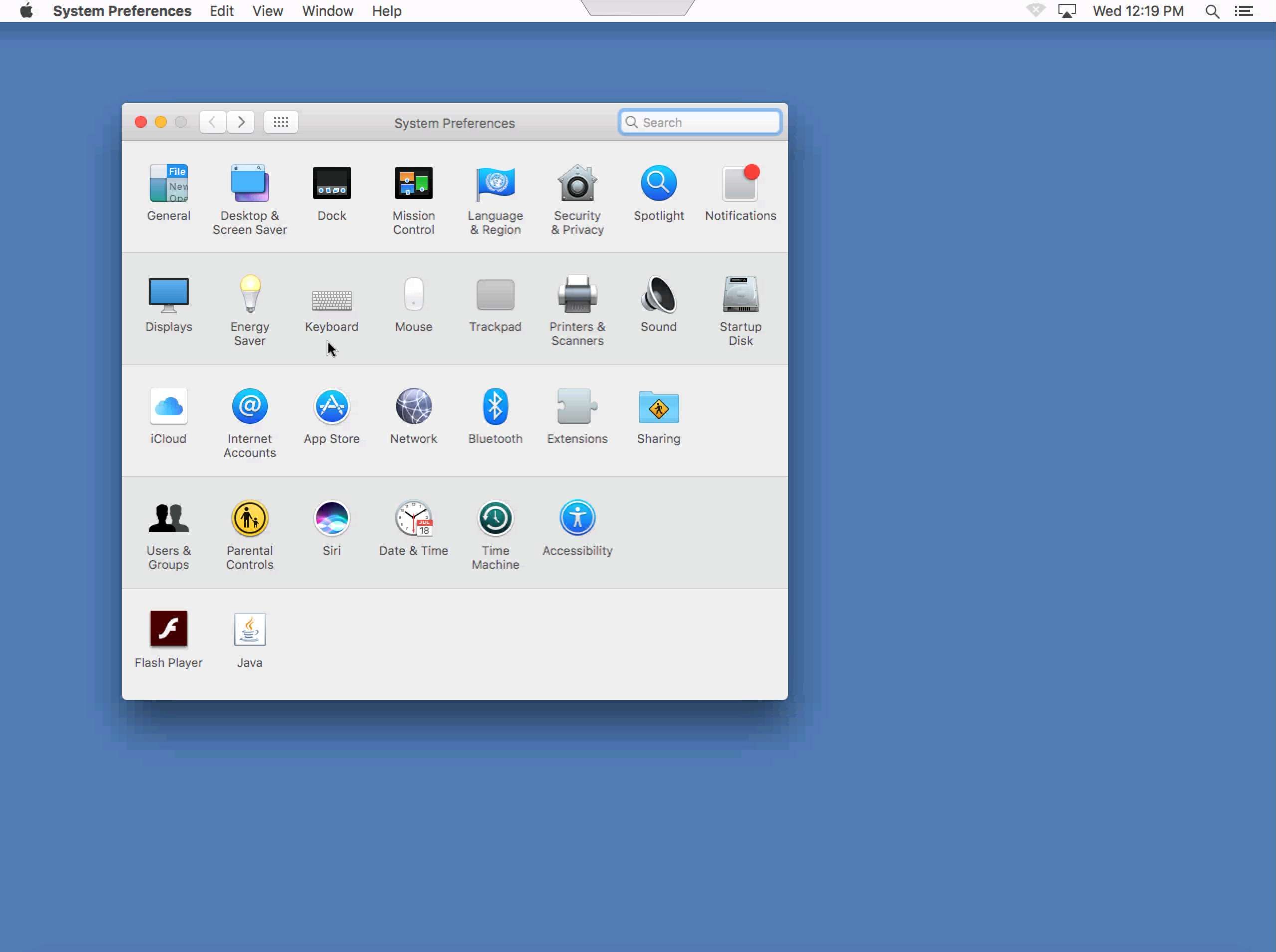 Снимок экрана системных настроек macOS с указателем на клавиатуре