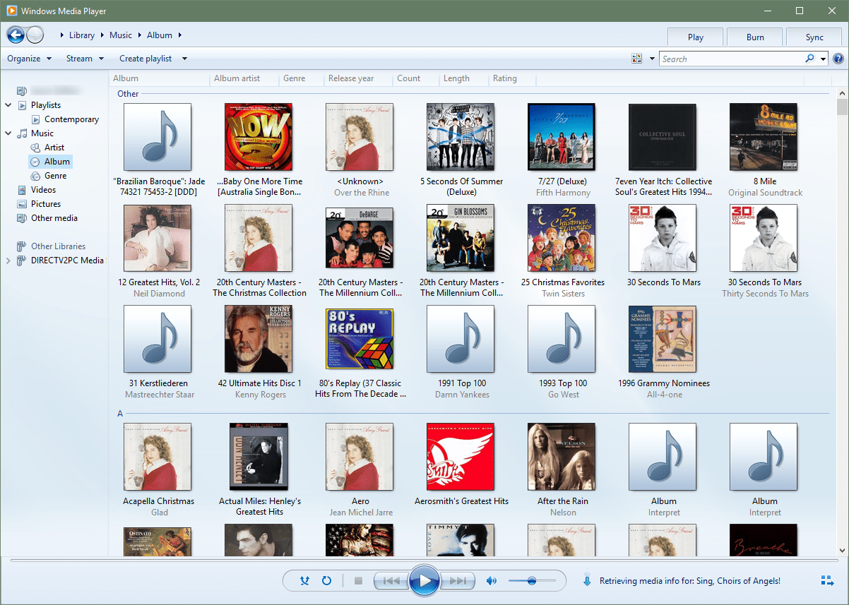 Windows Media Player показывает текущие альбомы.