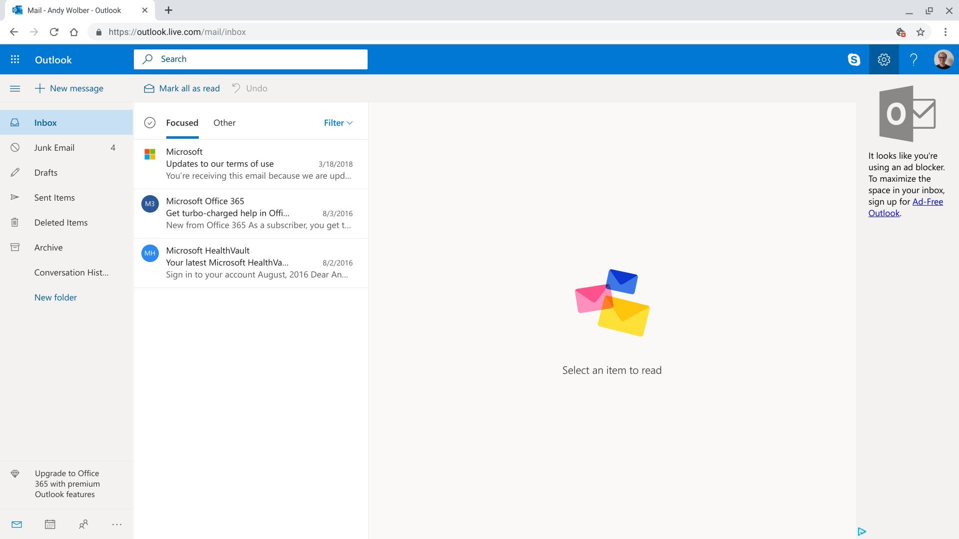 Снимок экрана Outlook в Интернете с выделенными параметрами в правом верхнем углу