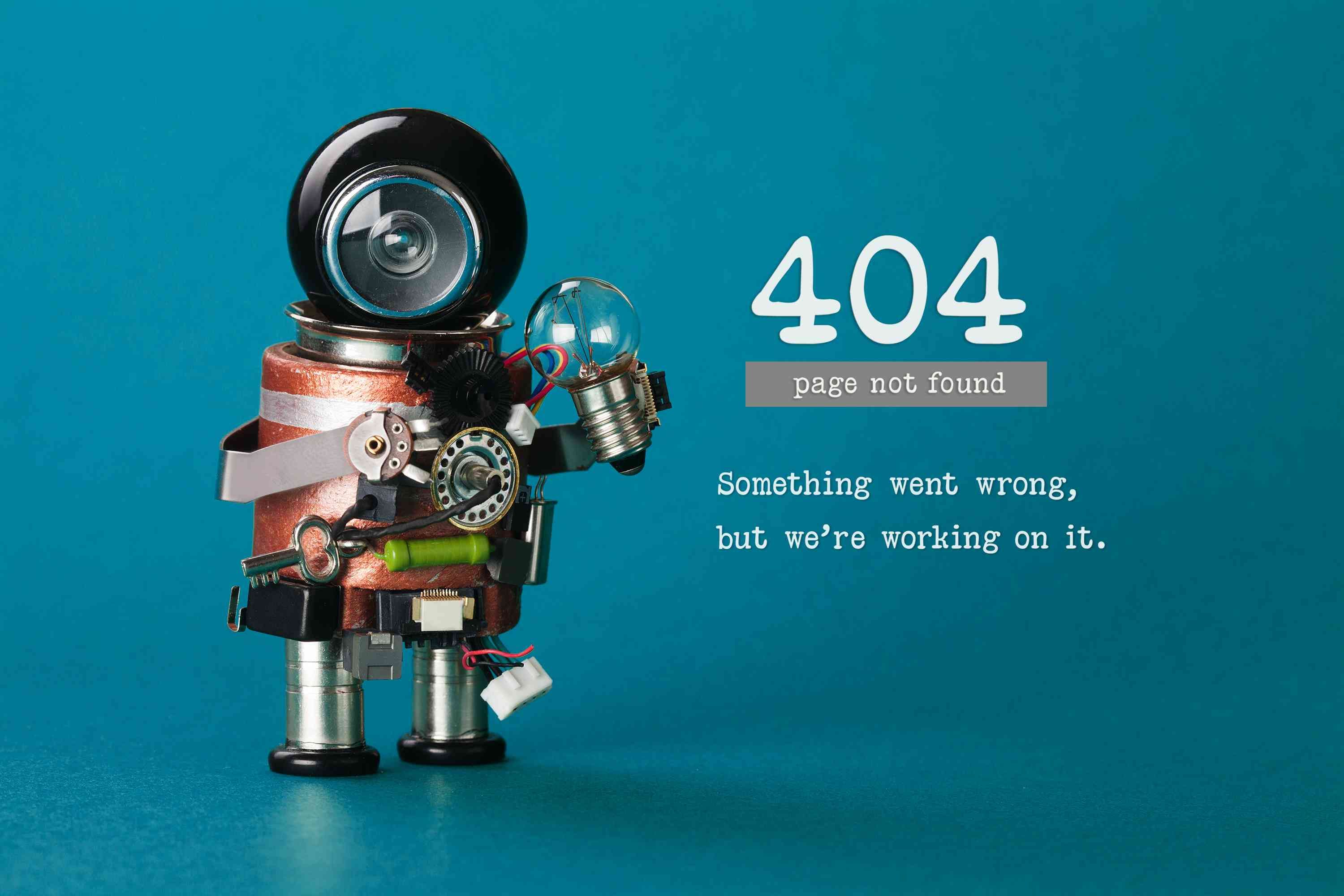 Страница ошибки 404 с роботом из мелких электронных предметов