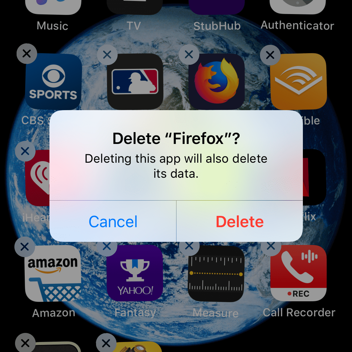 Снимок экрана с сообщением о подтверждении удаления приложения в iOS