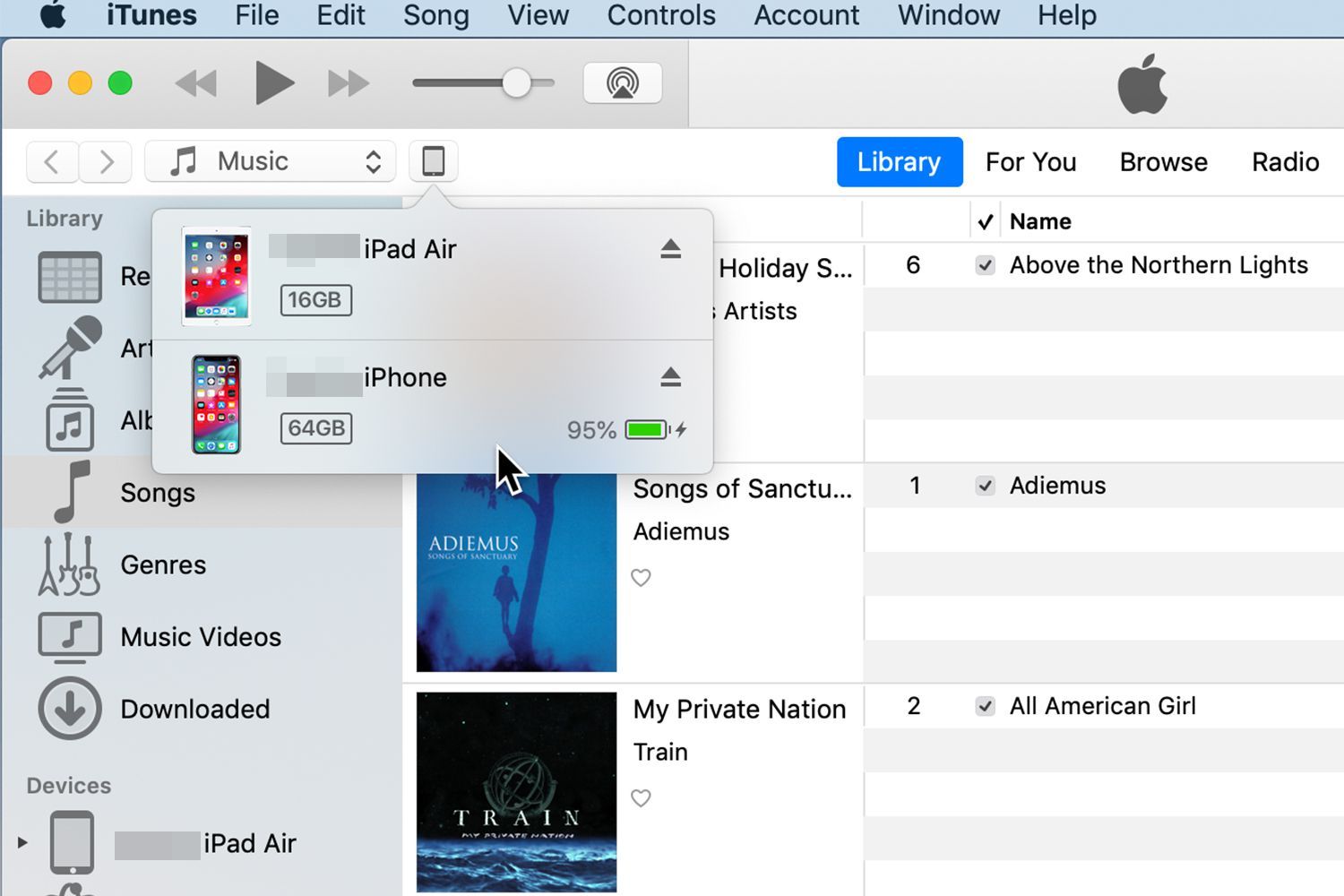 iTunes показывает раскрывающееся меню выбора устройства