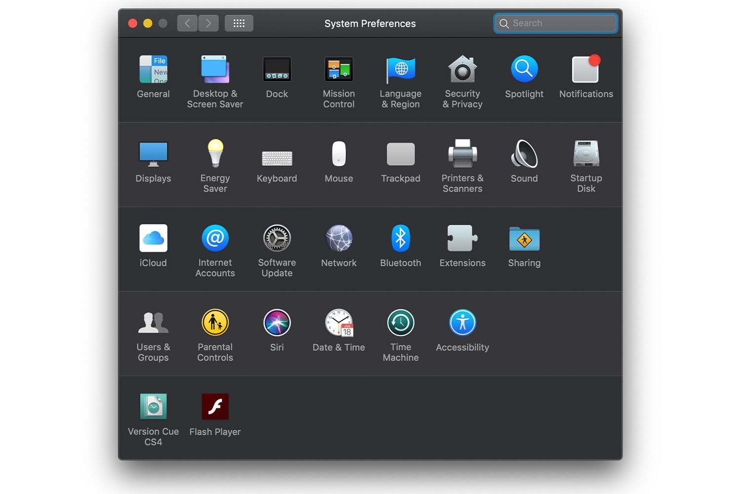 Экран системных настроек Mac в темном режиме