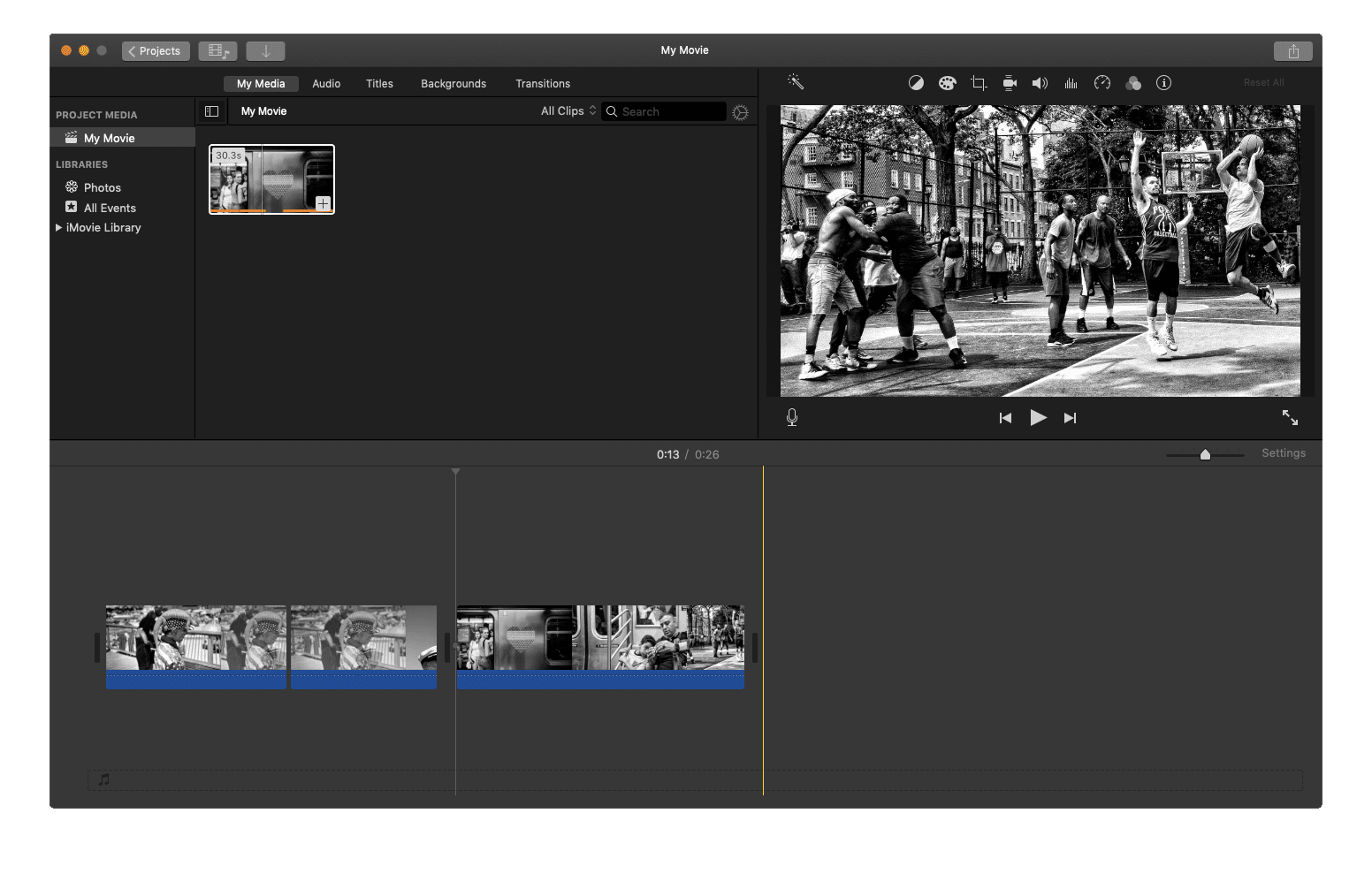 Проект iMovie с выделенным значком общего ресурса.